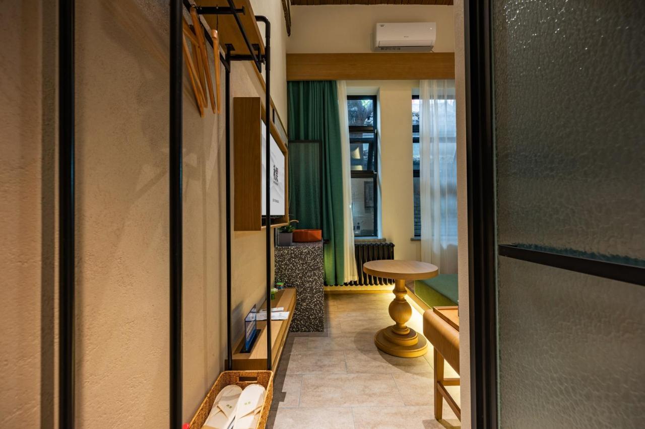 Qiuguo Hutong Courtyard Hotel Pequim Exterior foto