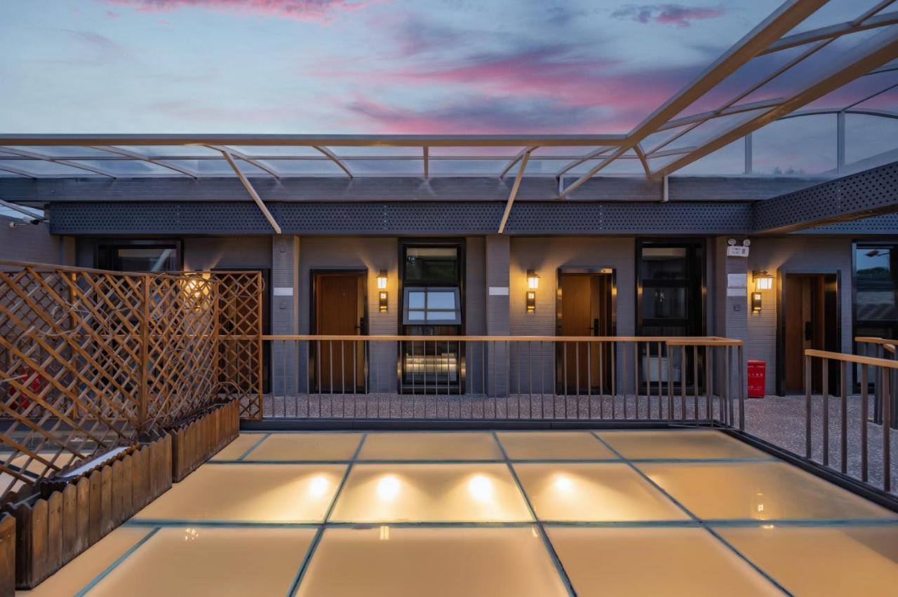 Qiuguo Hutong Courtyard Hotel Pequim Exterior foto