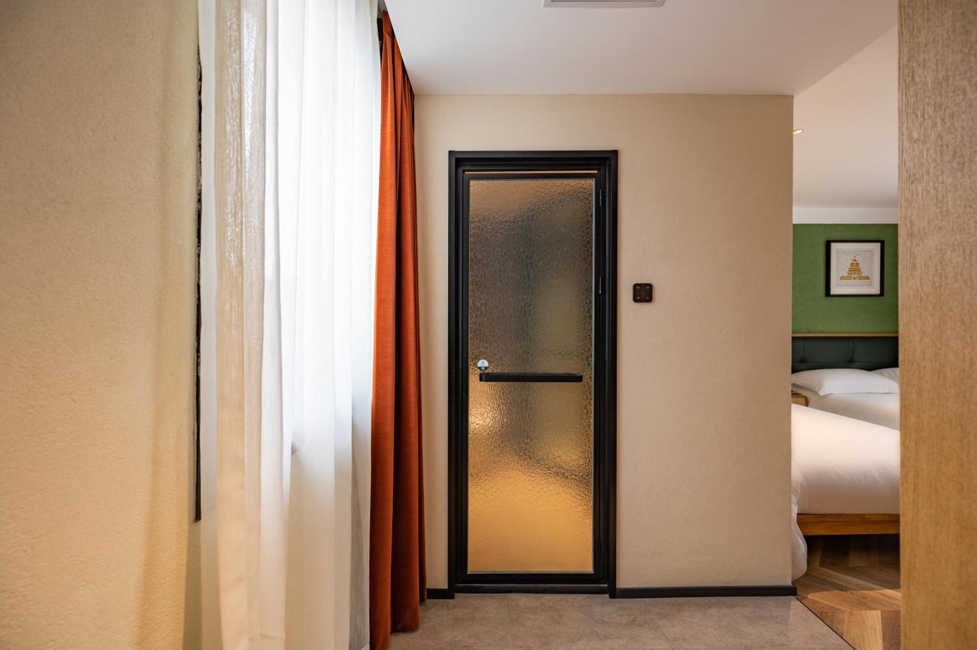 Qiuguo Hutong Courtyard Hotel Pequim Exterior foto